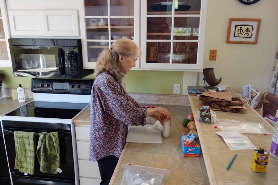 Kay makes sandwiches for the trip home.