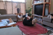 Kay does a glute stretch.