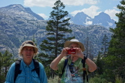 Madie sets up to take a photo while Nancy watches.