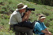 Brian takes a photo, while Nancy enjoys the scenery.