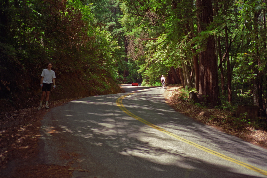 Chris climbs up the steep twisties on Alba Rd.