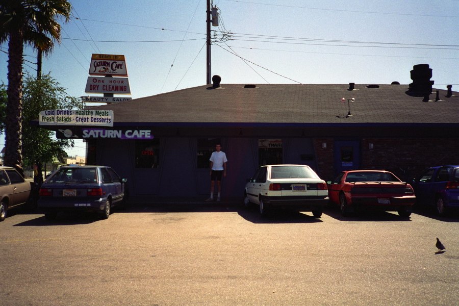 Bill stands outside the old Saturn Cafe.