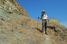 Bill climbing up the quarry to the summit of Mine Hill