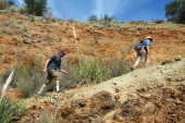 Gino and Frank climb the wall of the quarry atop Mine Hill.