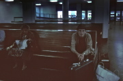 Bill sits glumly in the Transbay Terminal.