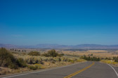 Carson City lies past the low hills at the north end of the valley at the left.  Nearer at center and right are Minden and Gardnerville.
