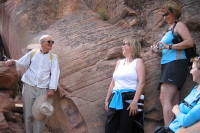 David exchanges a few words with a group of young women on their way up.