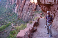 The trail is cut into the rock face.