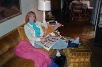 Kay resting with her foot in a sling