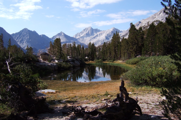 Resting at a tarn along the Mono Pass Trail.