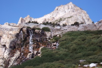 The use trail climbs steeply up to a bench below the Conness Lakes.