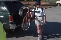 Barbara and her bike on the back of her SUV