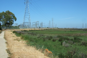 Frank rides past an East Palo Alto substation.