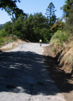 Laura climbing the rough part of Eureka Canyon Rd. (1680ft)