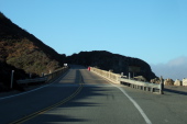 Ron crosses the Rocky Creek Bridge.