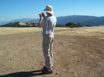 Video: Bill checks for reception on the windy summit.
