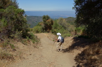 Frank starts down a steep section below the summit.