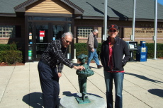 David, Johnny Appleseed, and Laura at the Johnny Appleseed rest stop near East Templeton, MA