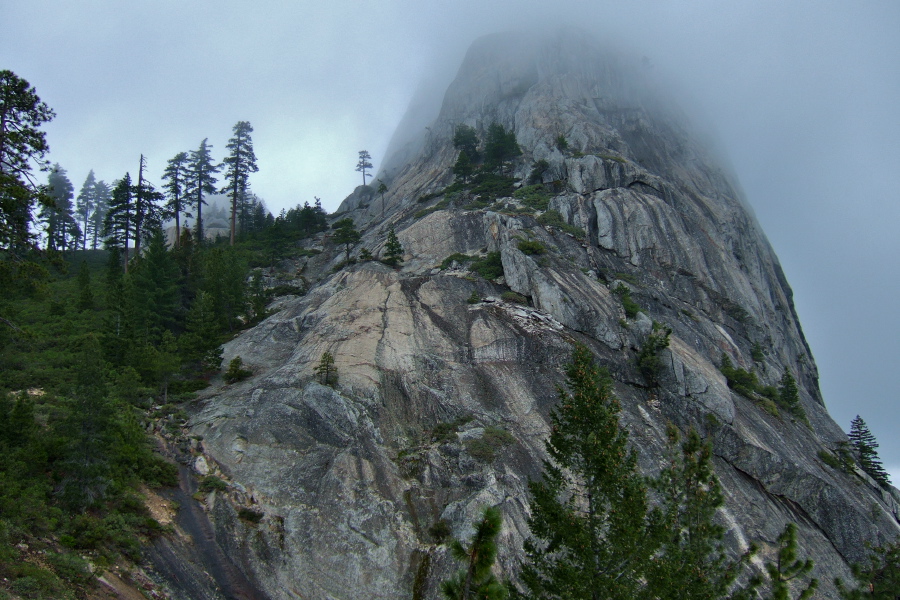 First view of Castle Dome in the clouds, viewed from the Crags Trail.