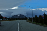 A dark cloud enshrouds the summit of Black Butte.