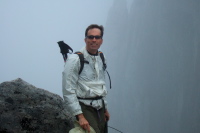 Bill stands at one of the posts still securely attached.