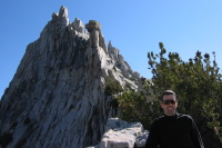 Bill at Cathedral Peak 3 (10720ft); the summit pinnacle behind is at 10971ft.