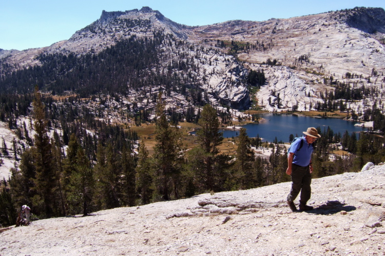 David (l) and Ron climb up the granite to the Cathedral Plateau.