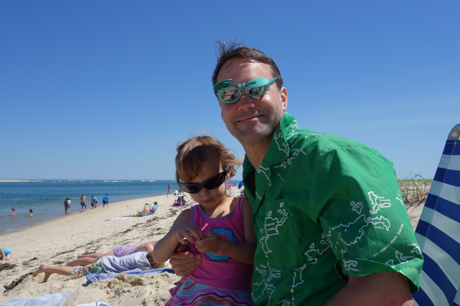 Ed and Natalie exchange dark glasses.