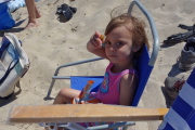 Natalie enjoys her energy bar.