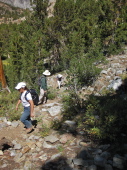 Stella climbs the steep trail to Ruwau Lake.