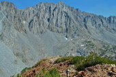David nears the summit under the shadow of Cloudripper.