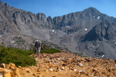 David reaches the summit of Chocolate Peak.