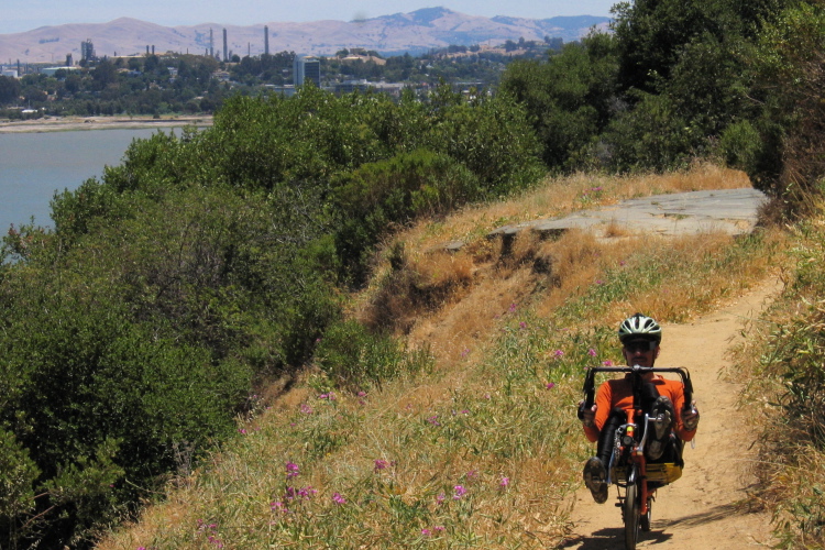 Zach rides across the washout.