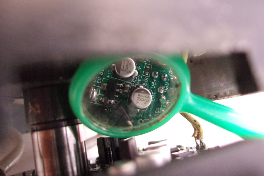 Some small cans on the controller board.
