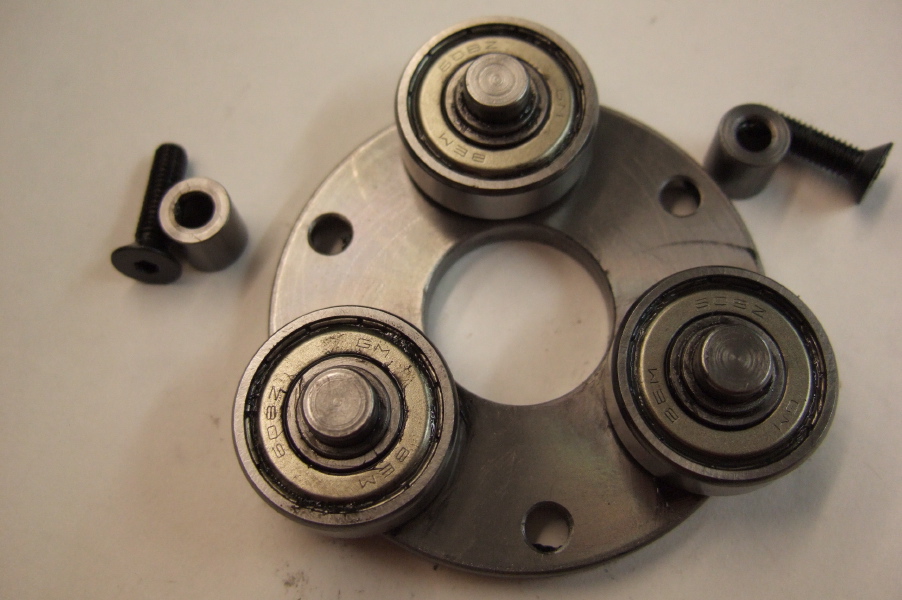 Lower planet carrier with bearings (608Z) and pins.