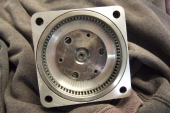 Planet carrier and ring gear for Cyclone planetary gearbox; planets removed.