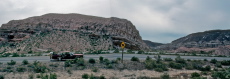 Dad gets something from the trunk while we stop in Red Rock Canyon on CA14