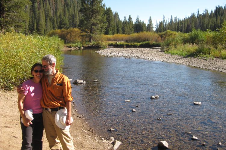 Stella and Frank enjoy the idyllic edge of the San Joaquin River where it runs through Devil's Postpile National Monument.