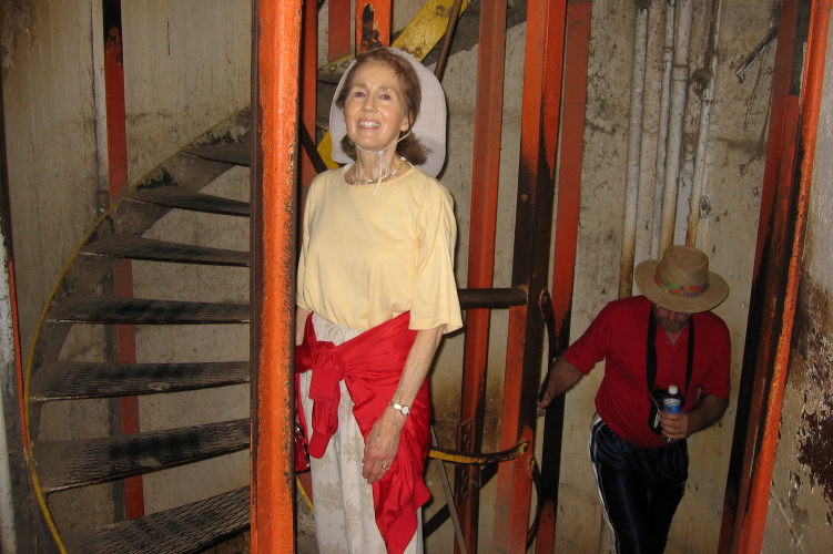 Kay climbing the spiral staircase.