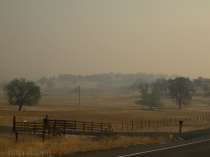 Thick smoke lies over the hills west of Sonora.