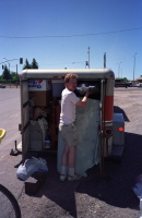 Dan rearranges things in the trailer in Ely, NV.