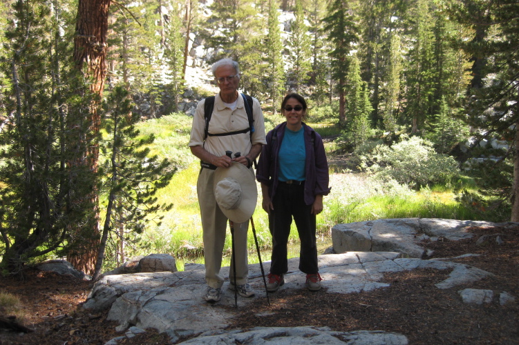 David and Stella stop at a small tarn.