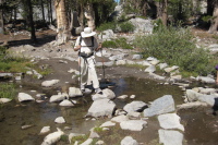 David crosses the creek.