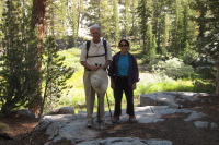 David and Stella stop at a small tarn.