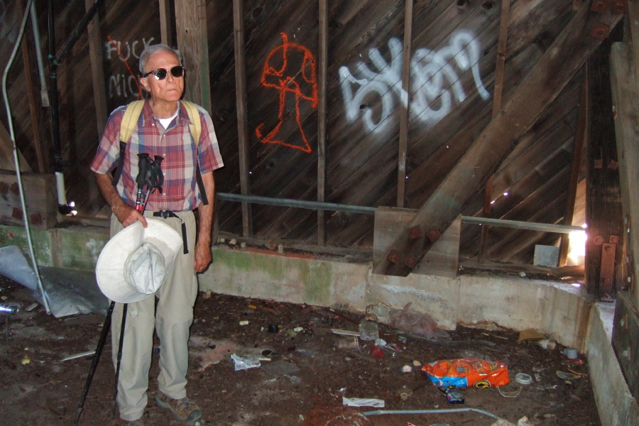 David models the trash on the ground floor of the tower.