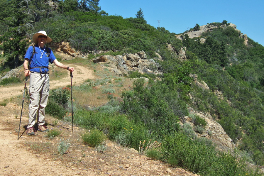 Bill descends the road from Eagle Rock (upper right)
