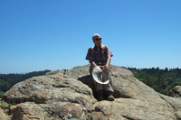 David sits on the summit of Eagle Rock.