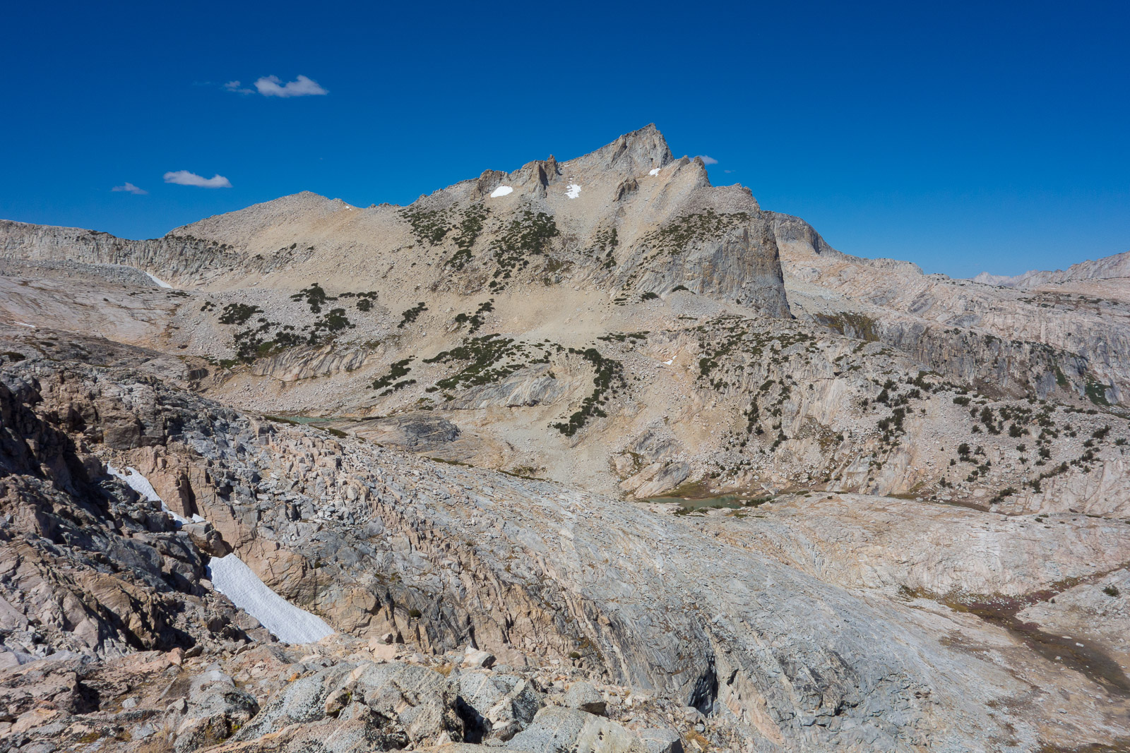 The granite slope immediately opposite is the northern spur off the East Ridge recommended by Roper as a descent.