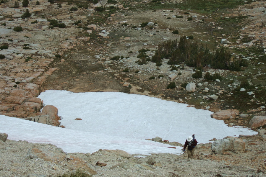 Frank finishes the climb off the snowfield.