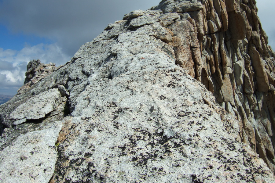 View back up the narrow ridge to the summit.